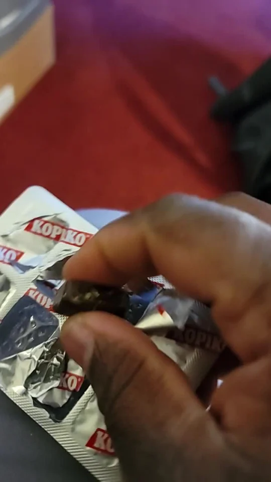 Kopiko candy shown in Olamisexy's customer video